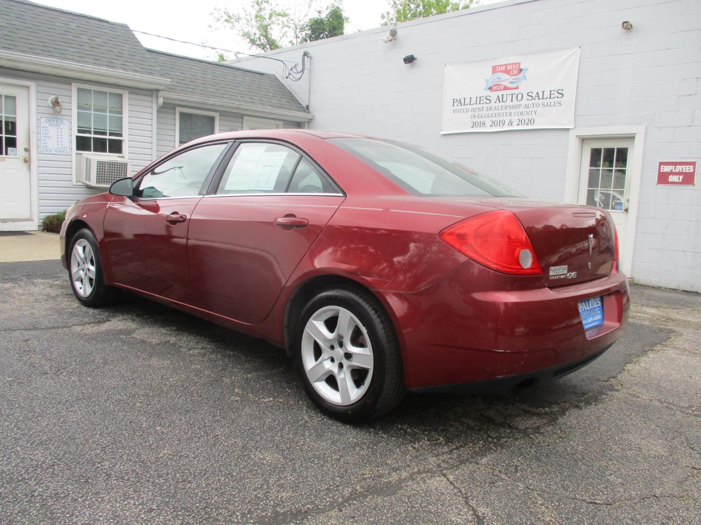 2009 RED Pontiac G6 Sedan (1G2ZJ57B994) with an 2.4L L4 DOHC 16V engine, 4-Speed Automatic transmission, located at 540a Delsea Drive, Sewell, NJ, 08080, (856) 589-6888, 39.752560, -75.111206 - Photo#3